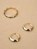 Juno gemstone ring styled with huggie hoop earrings