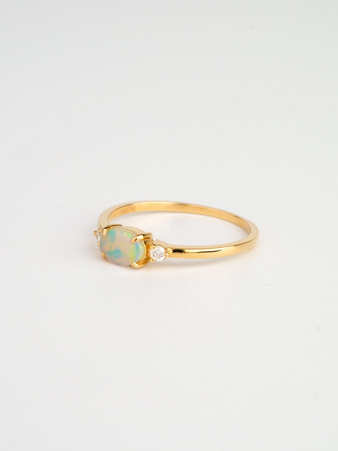 Oval Opal Diamond Three-stone Ring