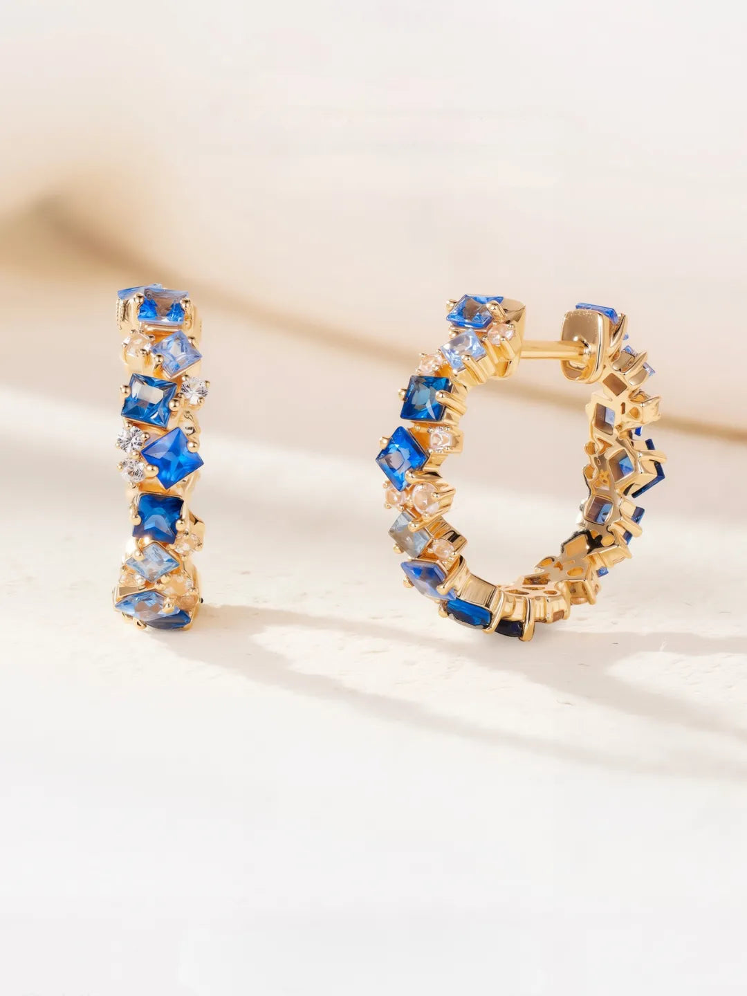 18k solid gold hoop earrings with blue sapphires and diamonds by PETRALO