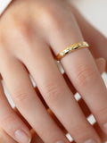 three star diamond 14k Gold ring on a person's finger by PETRALO